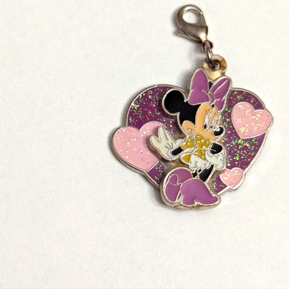 - Disney Minnie Mouse Charm . Silver toned on back.  Enamel on front. Spar…